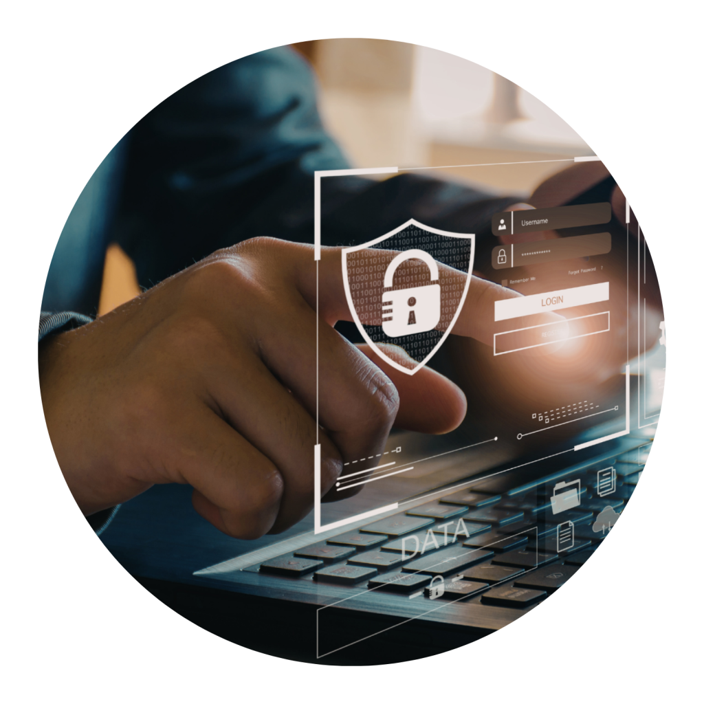 A person sitting at a desk using a laptop. Their finger is pointing in the air, touching a graphic of a login screen. A shield with a padlock is shown with binary numbers and other cybersecurity-related icons. Image is for decorative purposes.